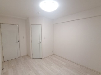 約6.5帖の洋室。※新築購入時の写真です。