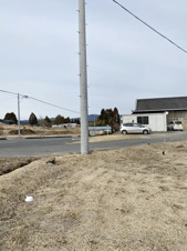 恵那市岩村町の売地【外観】現況写真（恵那市道から見た土地）