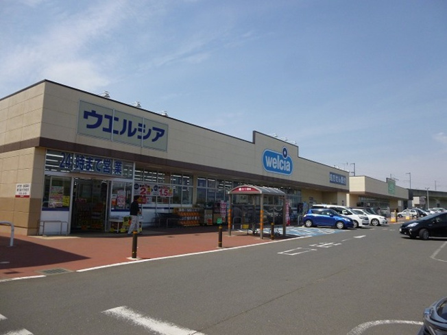 ウエルシア万博記念公園店