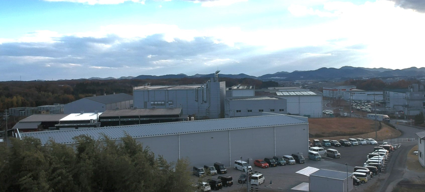 既存用地と駐車場拡張による一体開発事業の画像